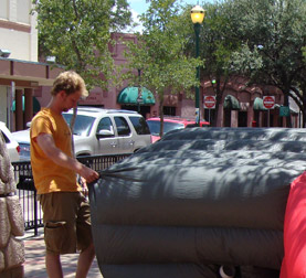 Big Red Jimmy Kuehnle sets up his Big Red inflatable suit