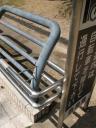 Stainless steel welded to rusting steel fence