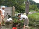 Mimi Kato washer her feet after a photo shoot in Seto-shi, Japan.
