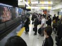 Semi-crowded train station in Tokyo, Japan.