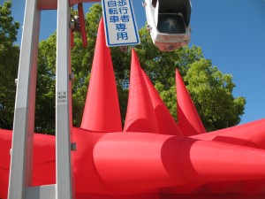 Inflatable Suit at Cross Walk Big Red Inflatable Suit