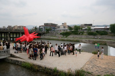 Jimmy Kuehnle\'s inflatable suit on the Kamo River