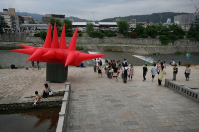 Big Red inflatable suit on the Kamo River bank