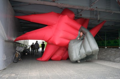 Jimmy Kuehnle smashes under bridge in an inflatable suit