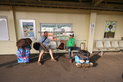Kjell Hahn and George Zupp wait for a train at Yamaguti Station
