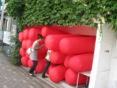 Pedestrians enter Jimmy Kuehnle\'s inflatable installation in Kyoto