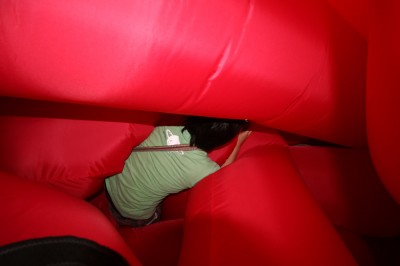 Person inside Stuffed Full Inflatable installation